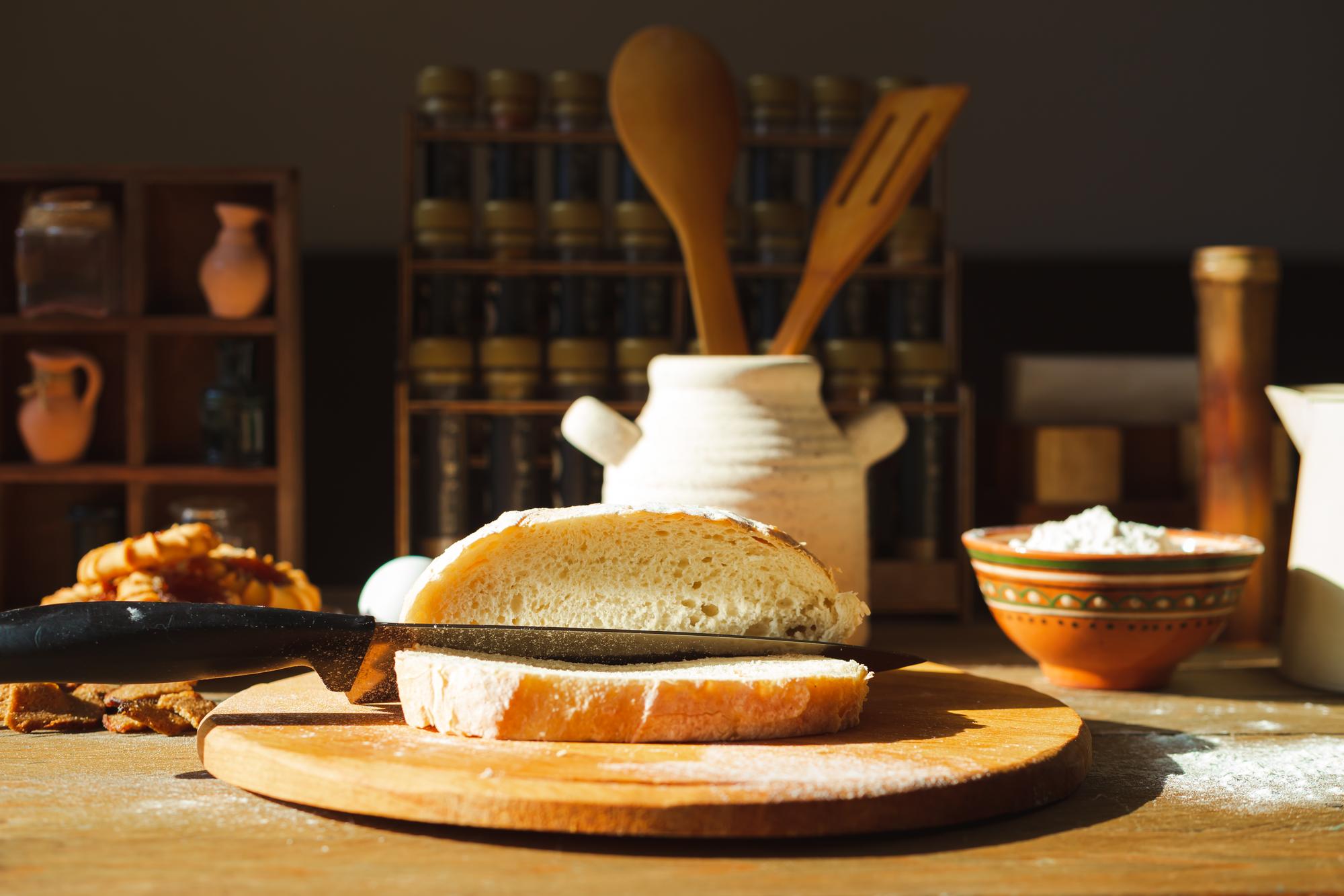 Artisan bread and spreads on wooden board